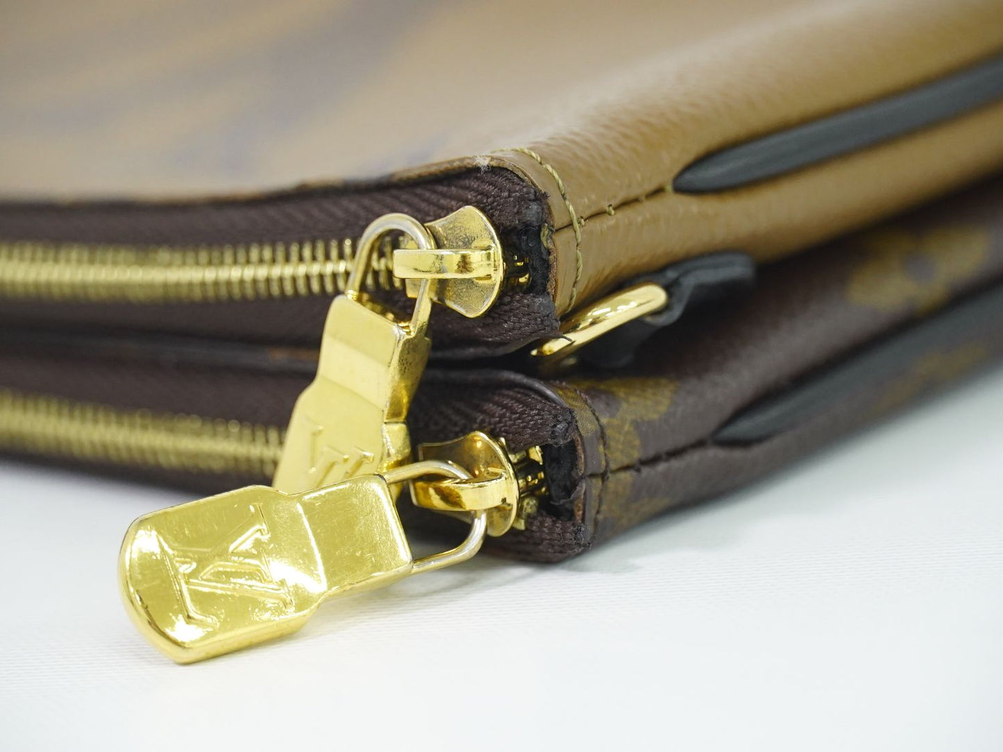 LOUIS VUITTON ポシェット ドゥーブルジップ モノグラム ジャイアント リバース ポーチ M69203