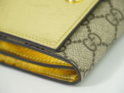 GUCCI GGマーモント 折財布 ベージュ ゴールド 598587